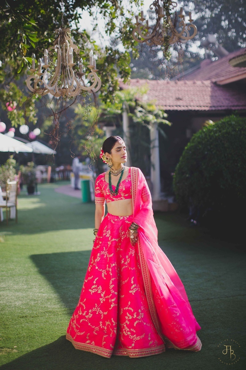 Ruby Red Georgette Wedding Lehenga Choli with Intricate Embroidery.