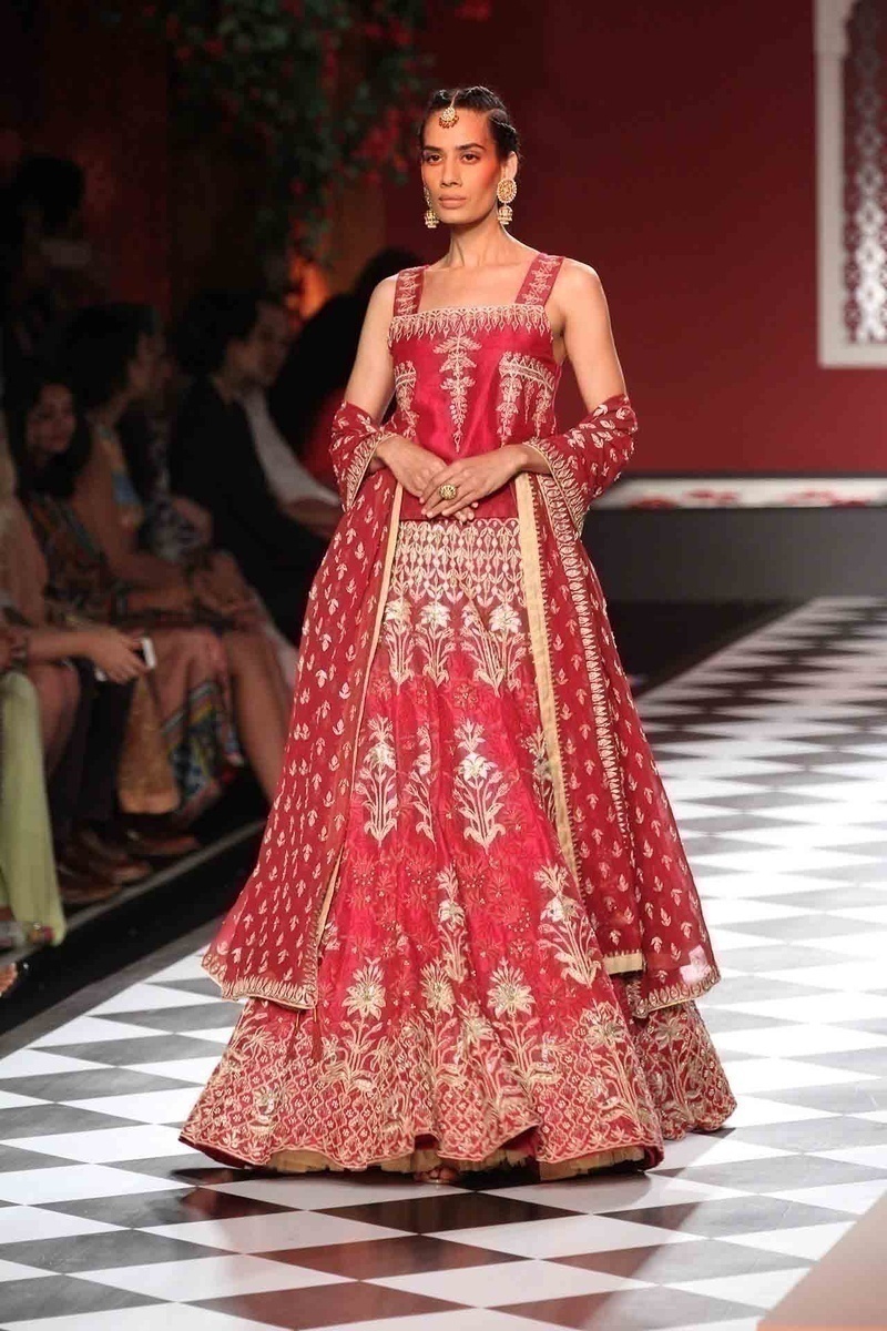 Red and Gold and Indian weddings have an age-old love affair. Anita Dongre successfully reingites this fire with a set of her collection in regal reds with accents of gold.