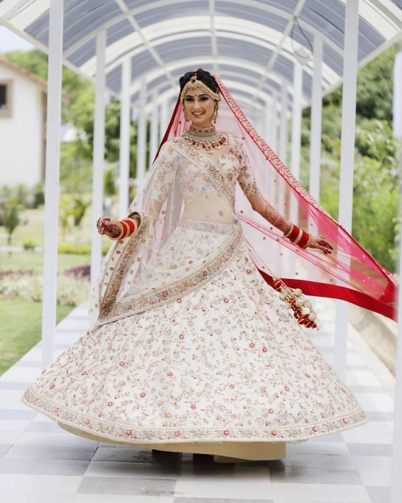 red and white wedding lehenga