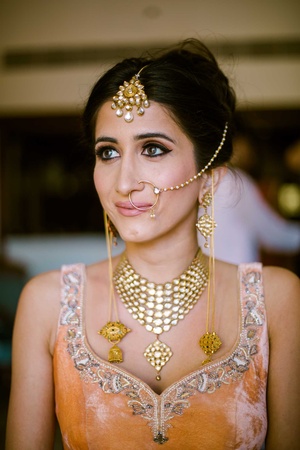 Golden lehenga with contrast green head dupatta n jewellery…………. Looks  awesome when brides mother itself designed @niyushii wedding lehenga… |  Instagram