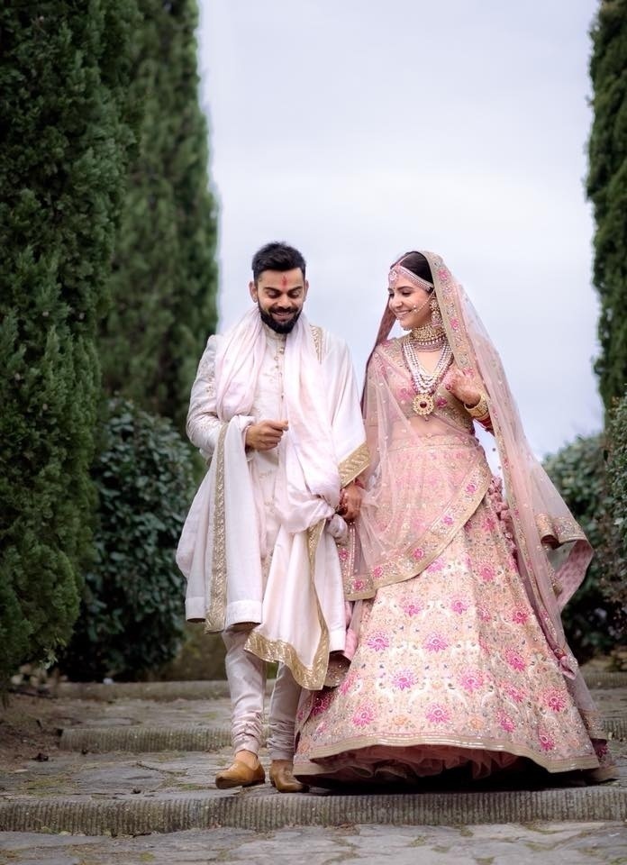 Match made in heaven, dressed to impress! This customized red bridal lehenga  and matching groom sherwani are the perfect combination of… | Instagram