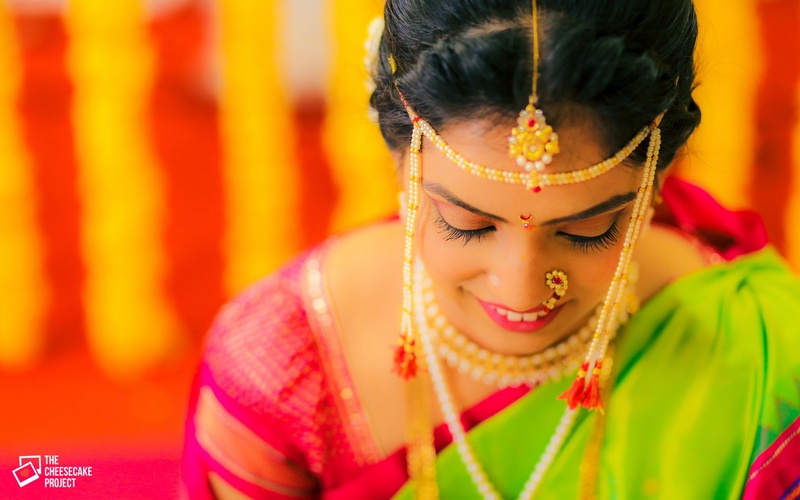 A beautiful banquet hall with yellow light chandeliers 
