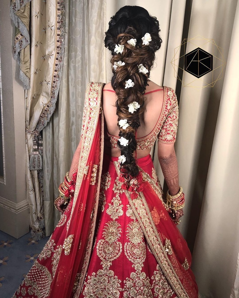 The Bride Donned A Rose Pink 'Lehenga' With Open Hairstyle For Her Day  Wedding