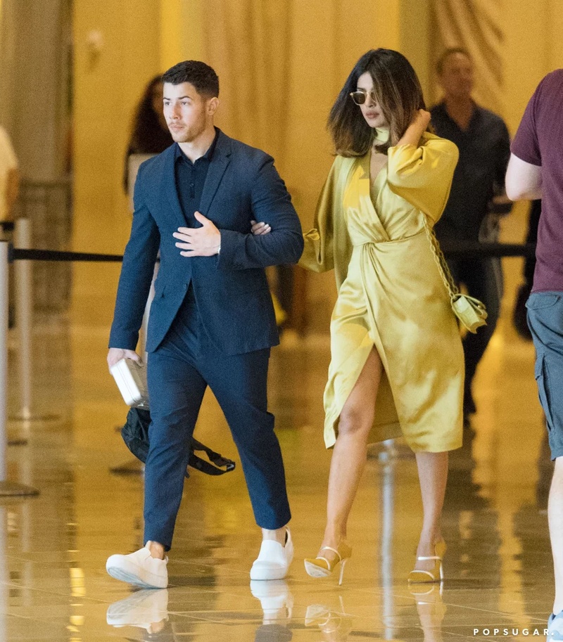 nick jonas white sneakers