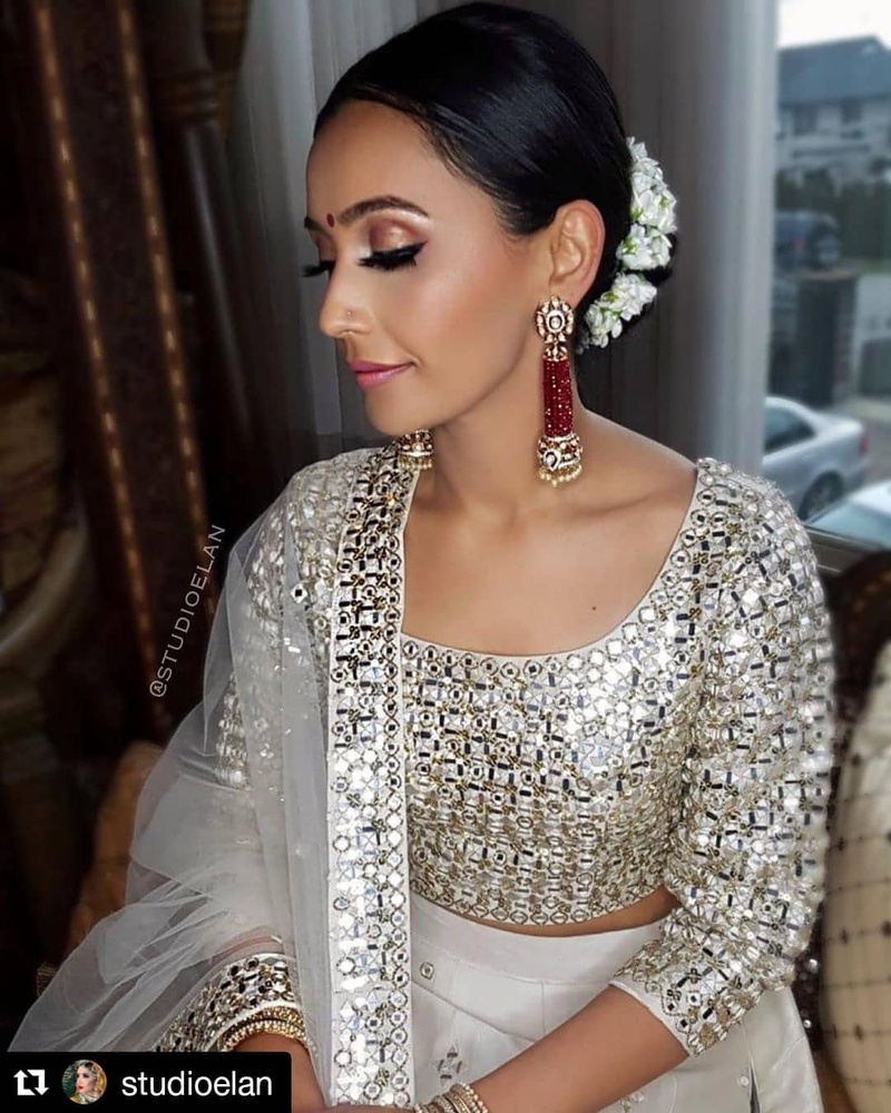 Pooja Hegde wears lighter-than-air white lehenga but her hairstyle steals  the wedding look | PINKVILLA