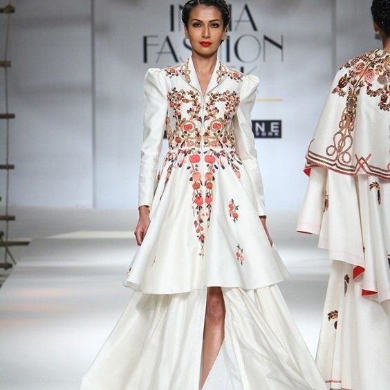 These exquisite designs of Samant Chauhan with the exaggerated shoulders, smart cuts, fluid silhouettes and his famous blood-red lining are definitely a steal.  