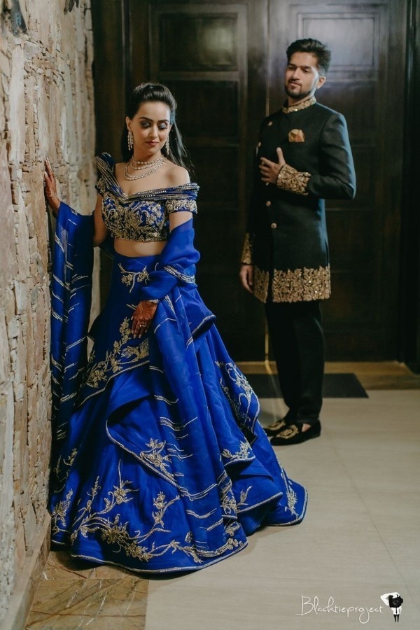23. Royal Blue Lehenga In Asymmetrical Flares