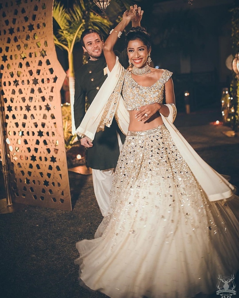 white lehenga bride