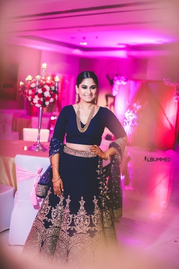 17. Dark Blue Lehenga With Intricate Golden Detail