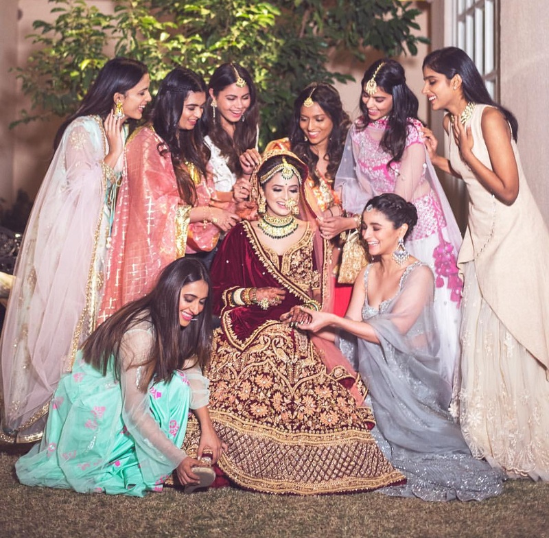 4. The bride squad making sure the bride looks just PERFECT for her D-day!