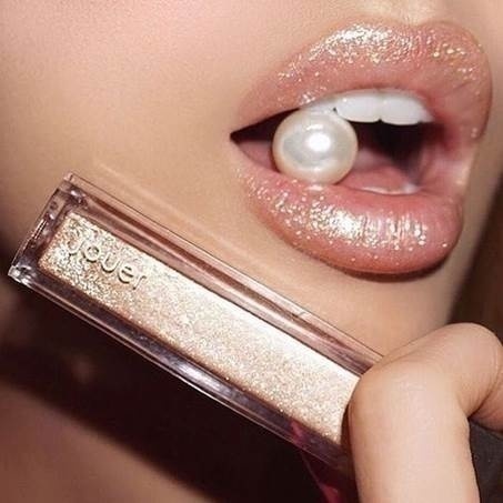 Lip gloss!
Gone are the days of matte neutrals.