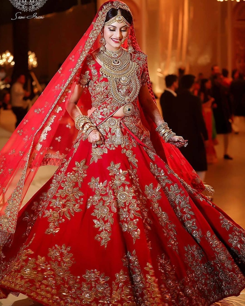 Bridal lehenga paired with brown color heavily embellished choli