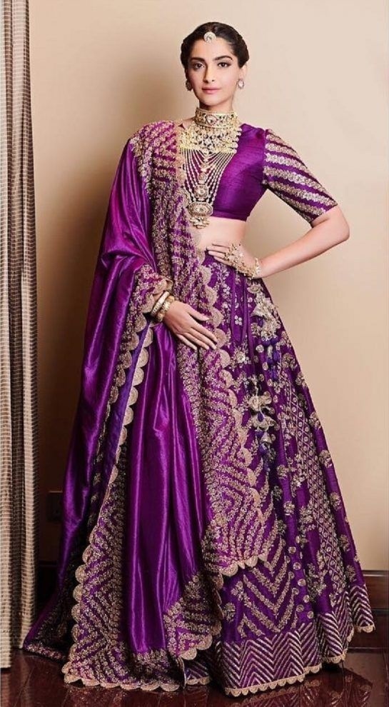 red and purple bridal lehenga