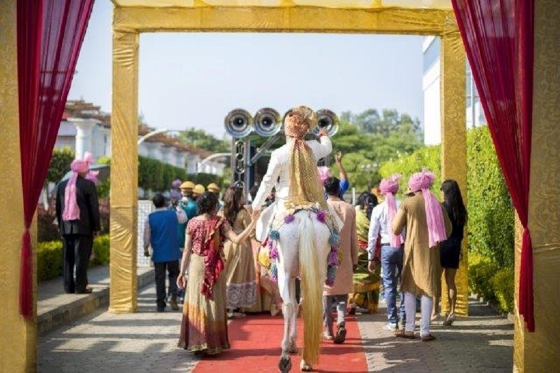 6. Making the grand entrance in the baraat: